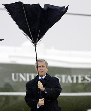 George W. Bush grappling with the concept of an umbrella